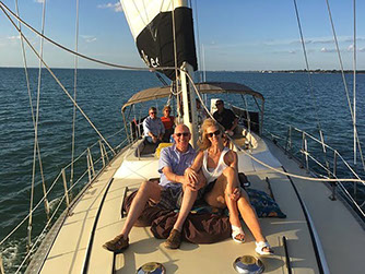 Guests relaxing on the bow of the Key Breeze
